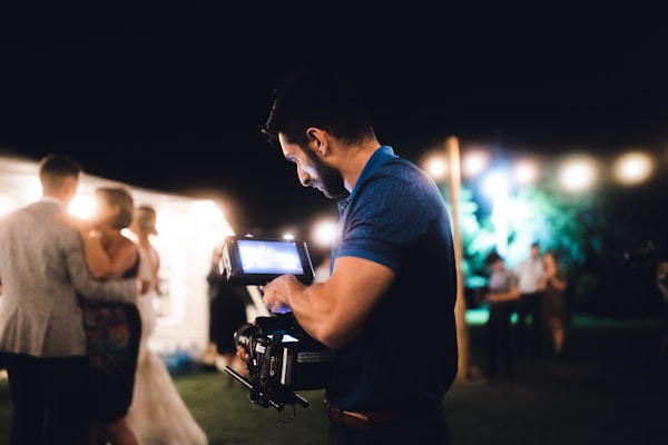 Wedding videographer filming cinematic moments